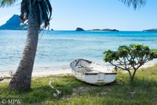 Dinghy on the beach at a native village in the Yasawa Islands, Fiji